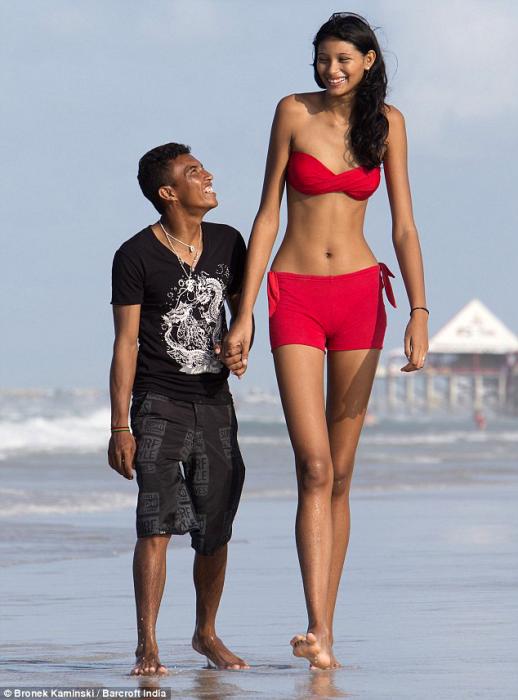 short lady next to tall person